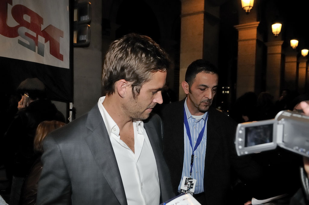 Photo of Paul Walker at Fast & Furious promo in Paris by Nicolas Genin